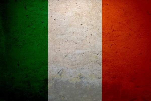 Vintage Italian flag on a concrete wall
