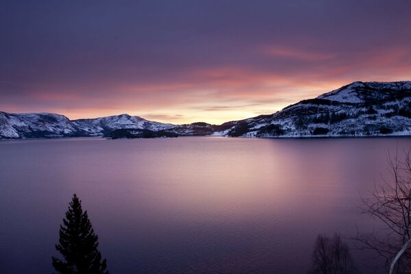 A beautiful lake among snow-capped mountains