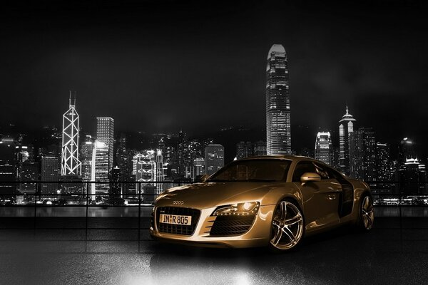Audi car rushes through the city
