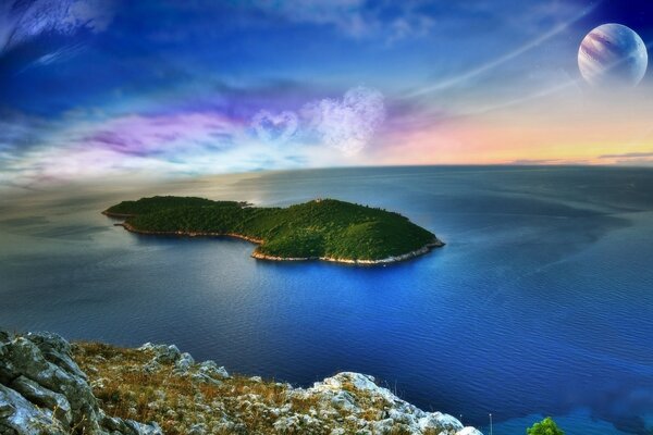 Green island in the sea on the background of the moon