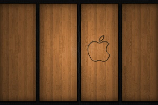 Apple sign on a wooden background