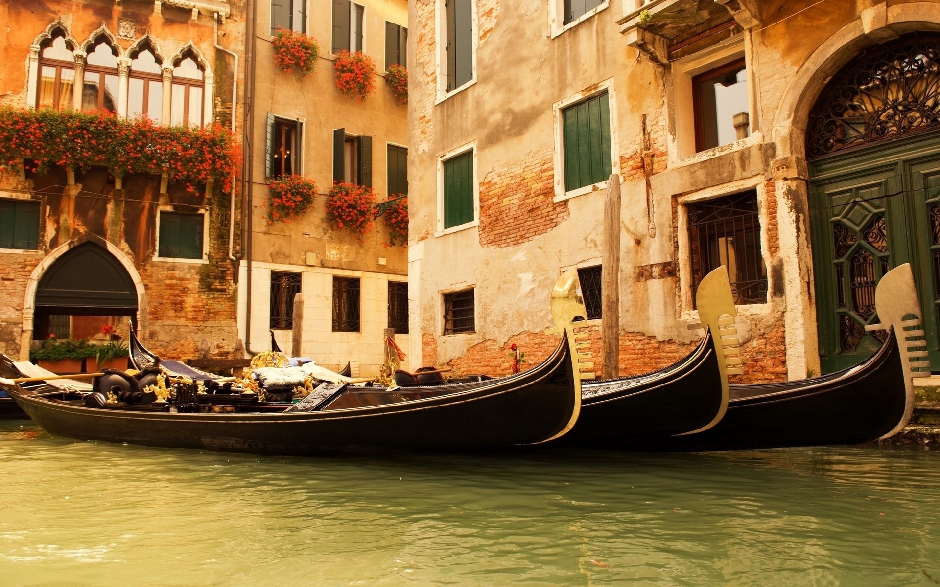 italy gondola venetian canal travel gondolier boat water vacation tourism traditional architecture city building transmit old grand lagoon transportation system tourist vintage photo