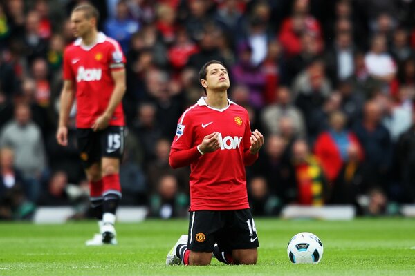 Kneeling before the ball, I call to heaven