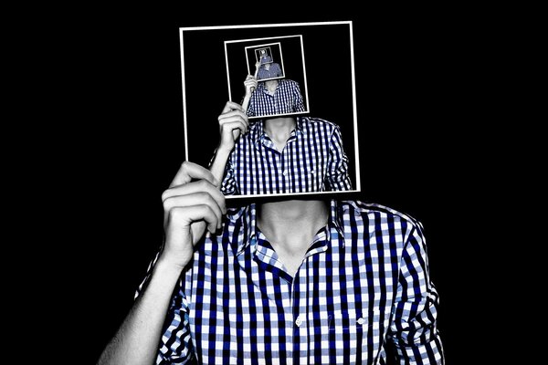 An adult makes a photo work of the desktop