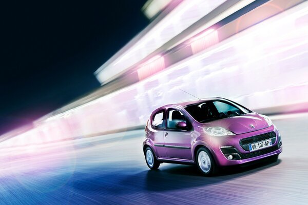 Pink car on the highway