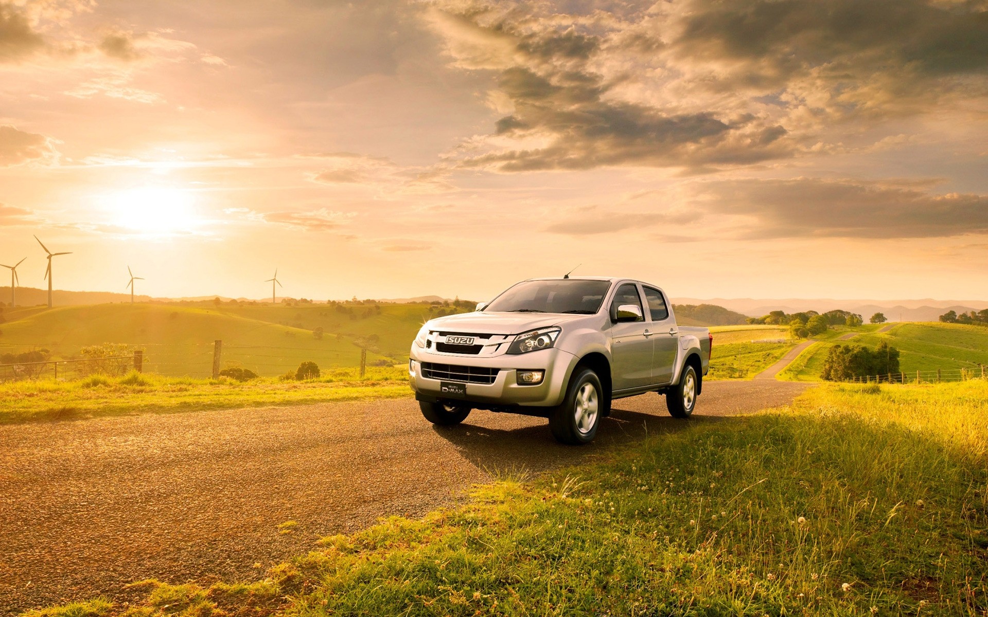 cars landscape sunset grass field road sky sun hayfield nature farm agriculture car countryside vehicle dawn rural