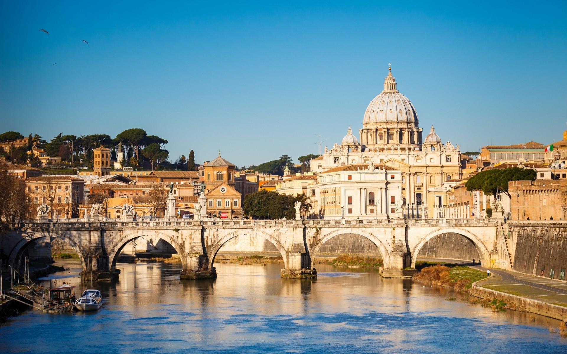 italy architecture city building travel church water landmark bridge river cityscape cathedral town tourism dome old sky urban ancient outdoors rome boat landscape