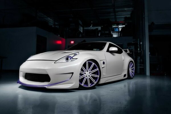 White car with purple wheels
