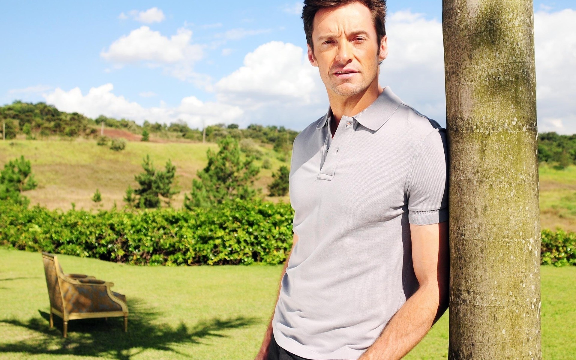 actors outdoors nature one grass man summer landscape park leisure adult relaxation tree portrait lifestyle hugh jackman actor