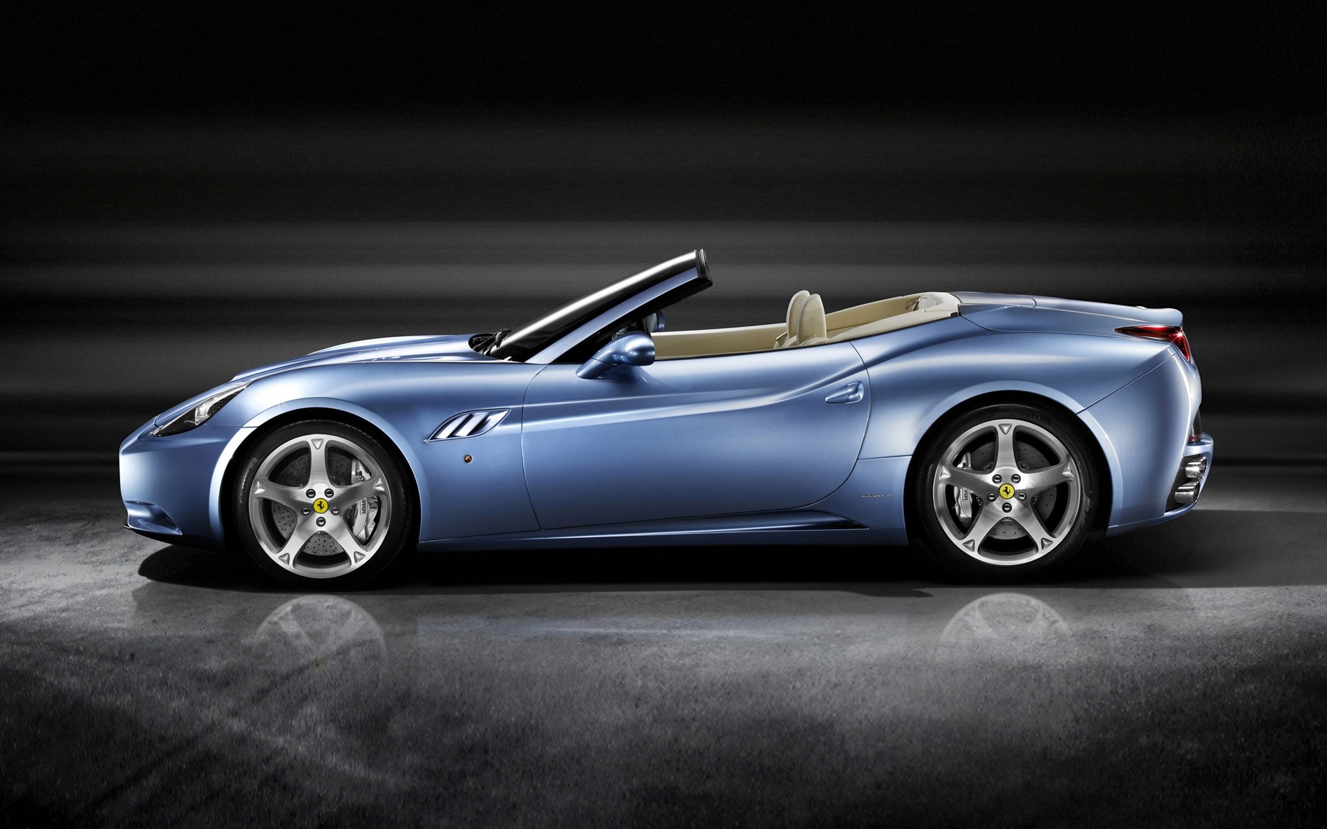 ferrari car vehicle fast wheel hurry race transportation system automotive blacktop drive noon asphalt coupe pavement action convertible ferrari california