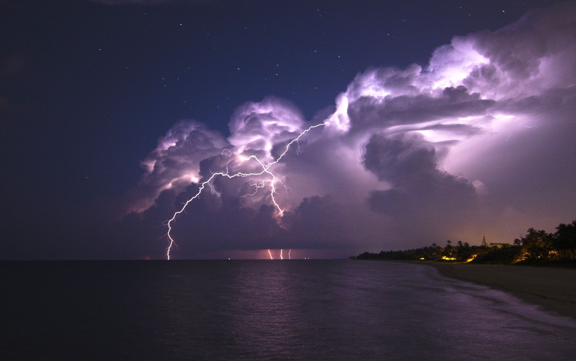 lightning storm sky landscape sunset water light dark ocean dusk evening weather sea thunderstorm sun rain beach dramatic nature cloud