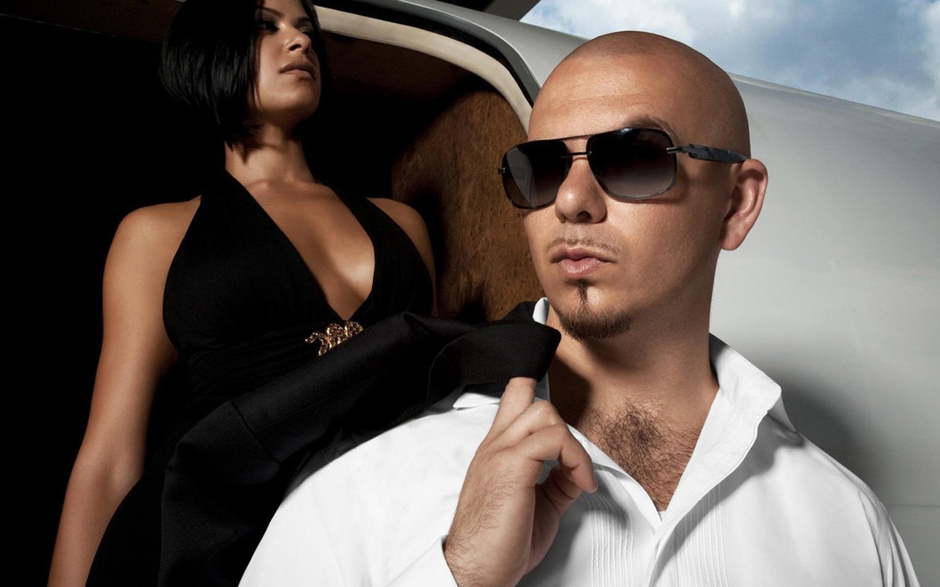 musicians man fashion sunglasses woman portrait indoors cuban luxury rich talent