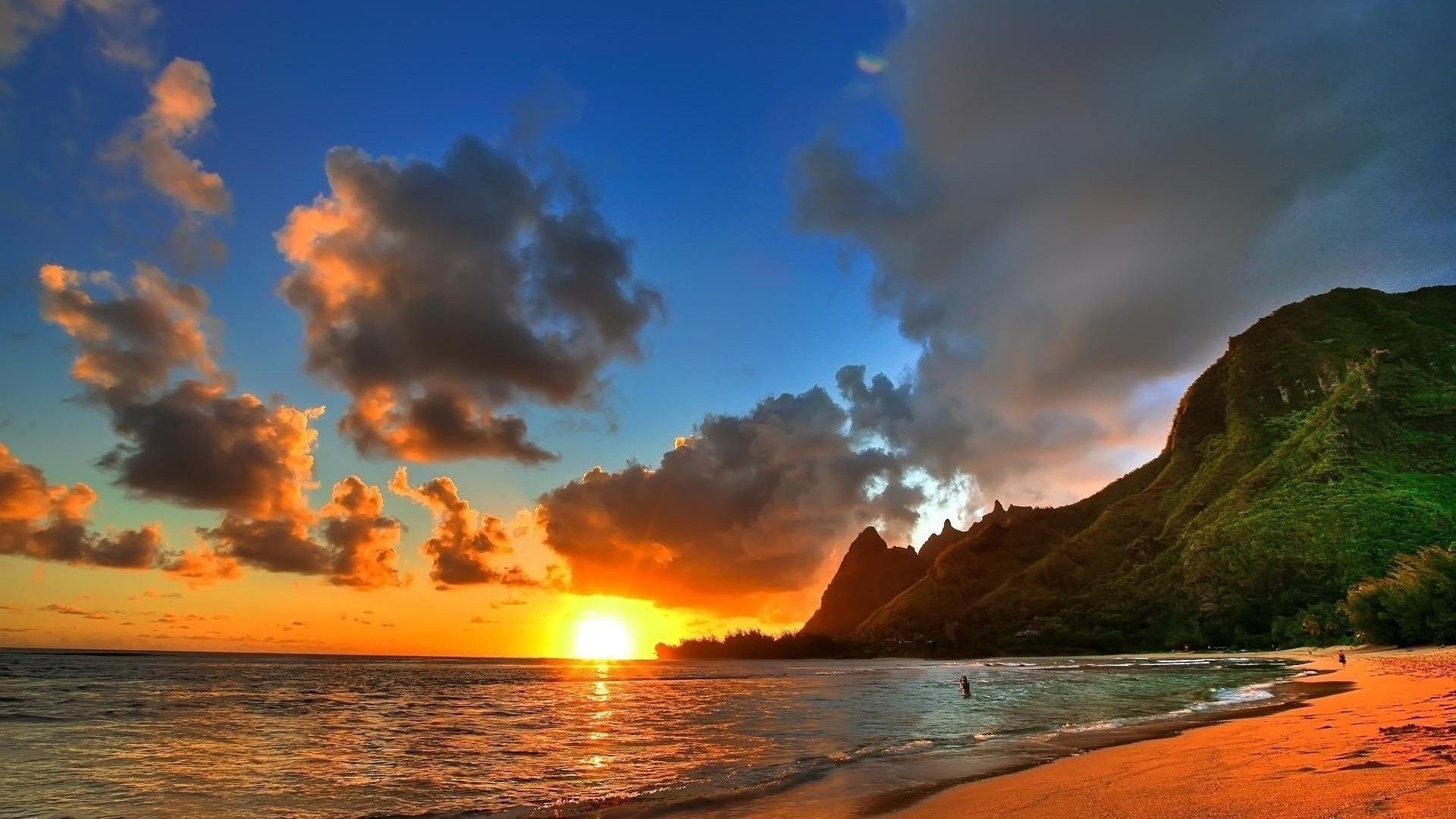 the sunset and sunrise sunset water sun beach dawn dusk sky travel ocean evening sea tropical fair weather seashore summer nature sand