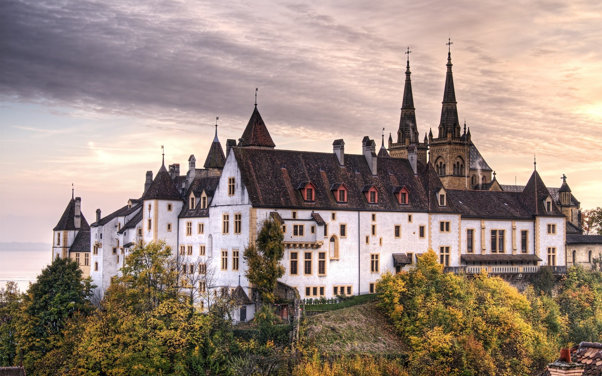 house and comfort architecture castle building gothic house old chateau travel outdoors river tower sky city ancient home roof town renaissance