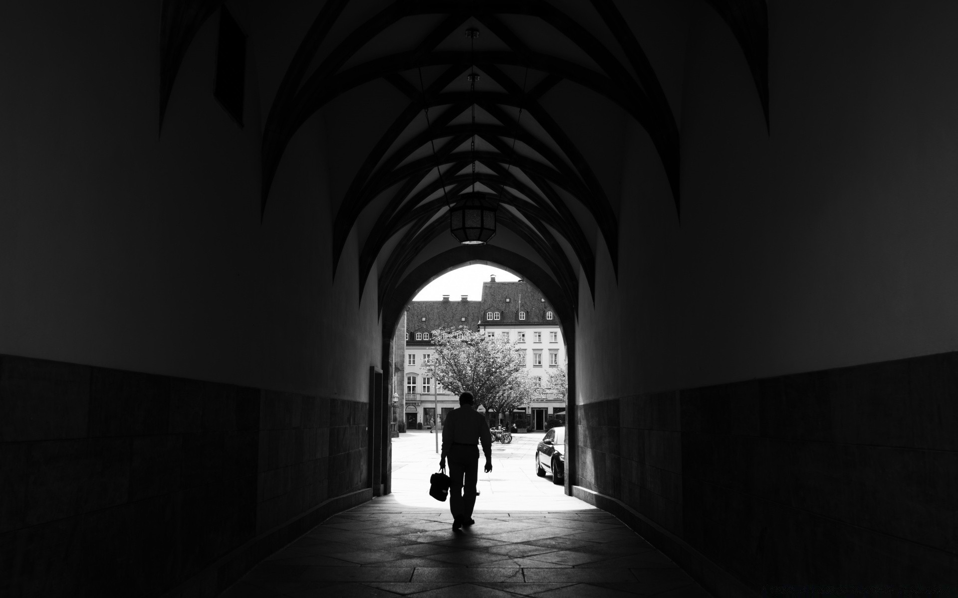 black and white architecture tunnel street arch light shadow building travel city monochrome