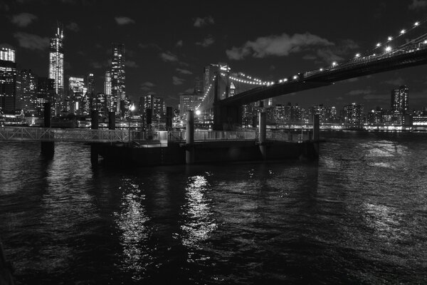 Black and white city river and bridge