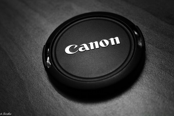 Still life with a camera cover on the table