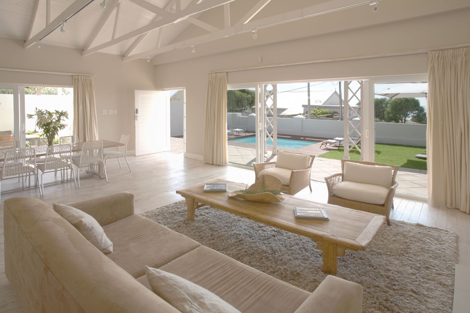 living rooms furniture room window indoors seat sofa home chair table house floor contemporary interior design family rug luxury apartment lamp mansion ceiling
