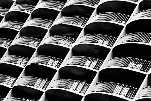 Multi-storey house with wavy balconies