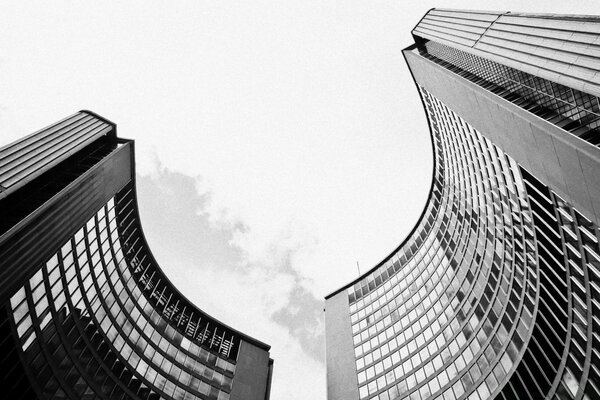 Two high-rise buildings on a black and white background