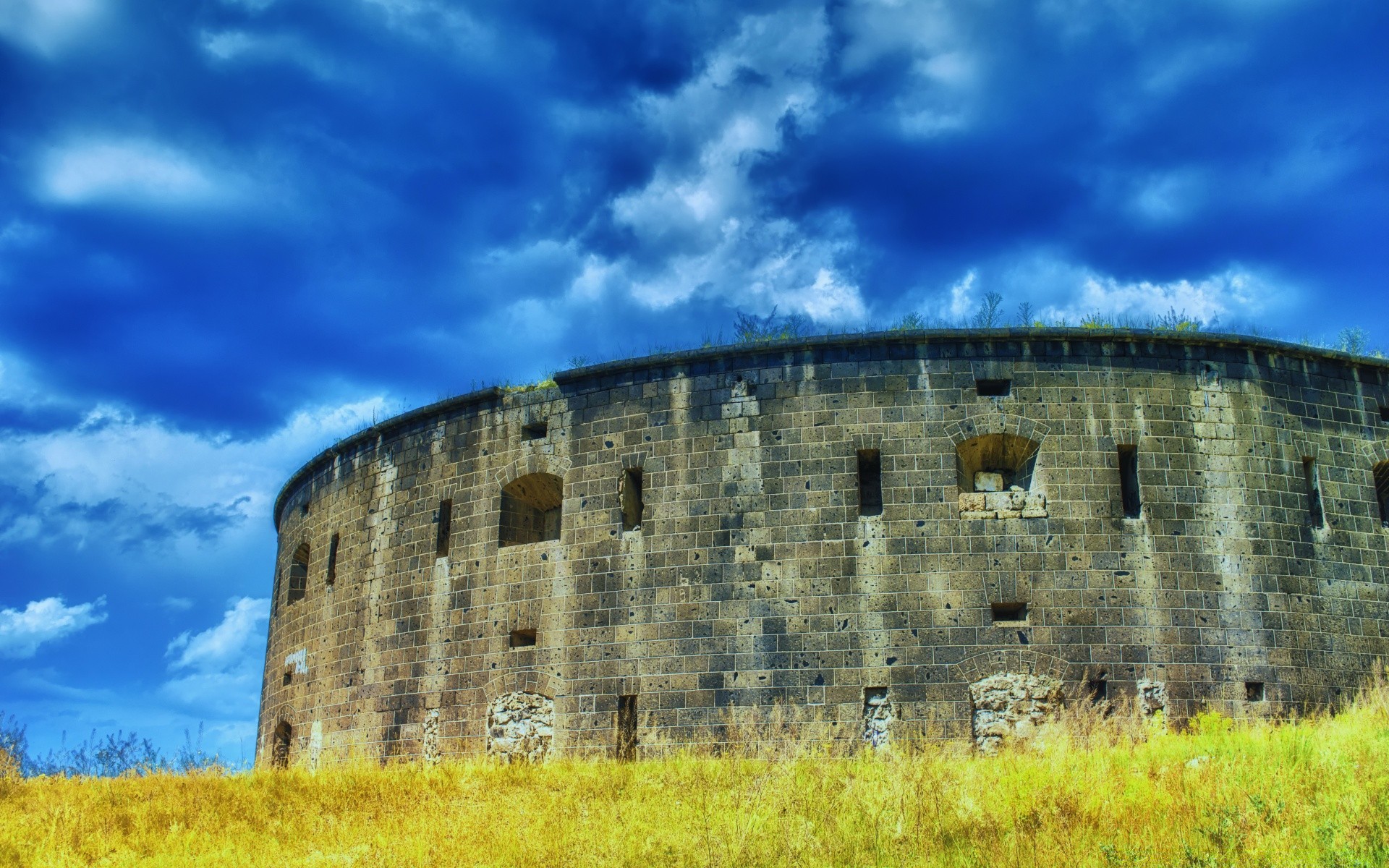 house and comfort sky architecture travel outdoors old castle ancient building fortification tower fortress wall gothic landmark landscape abandoned grass military