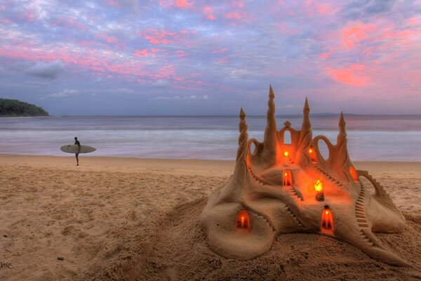 Sand castle on the seashore