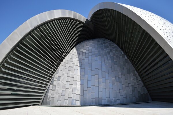The futuristic style of the building looks modern