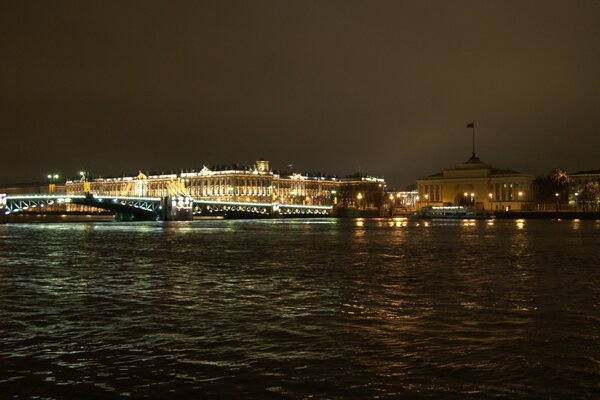 Urban night landscape with a bridge