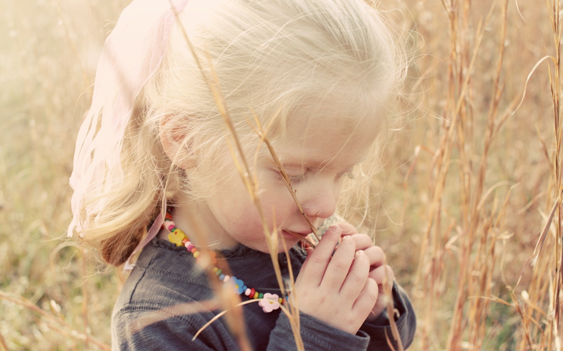 children nature girl outdoors child grass summer blond fall beautiful field portrait fair weather cute leisure woman fun hayfield smile park