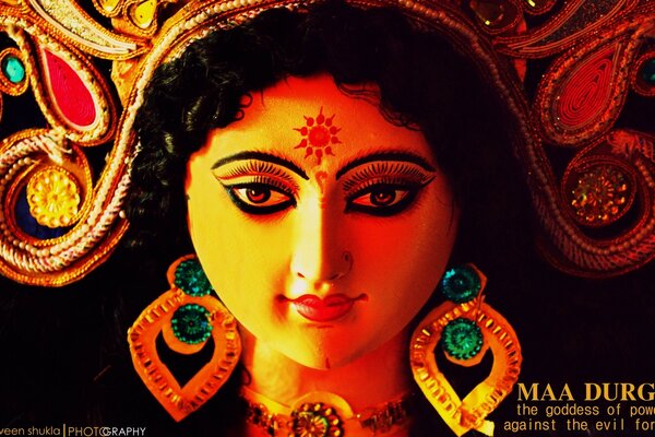 Indian doll with a red dot