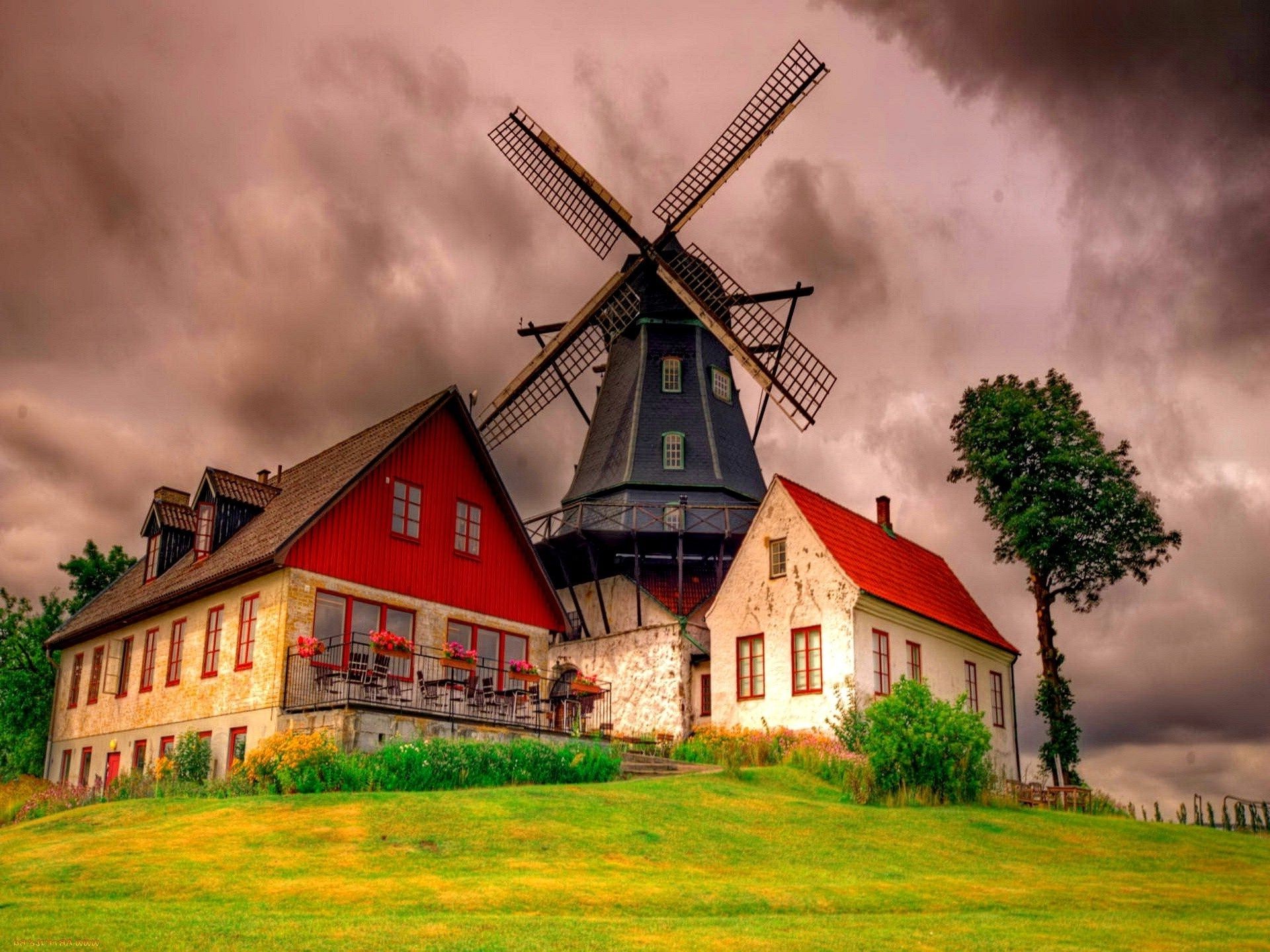 houses and cottages windmill architecture house sky outdoors grass rural farm countryside building landscape travel nature old traditional grinder cloud agriculture