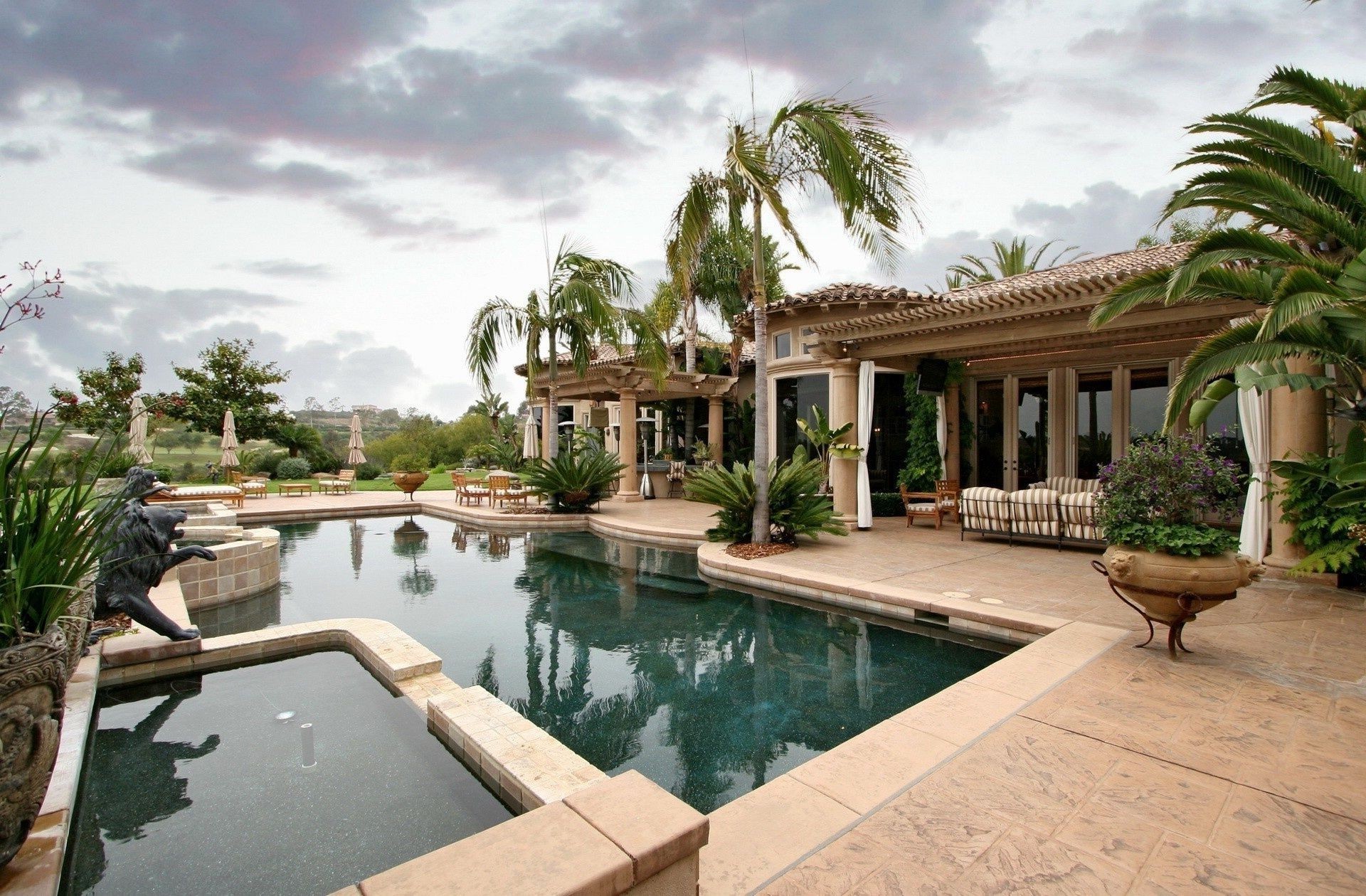 pools pool hotel luxury palm resort water swimming pool tropical travel patio tree villa vacation architecture house outdoors swimming summer poolside