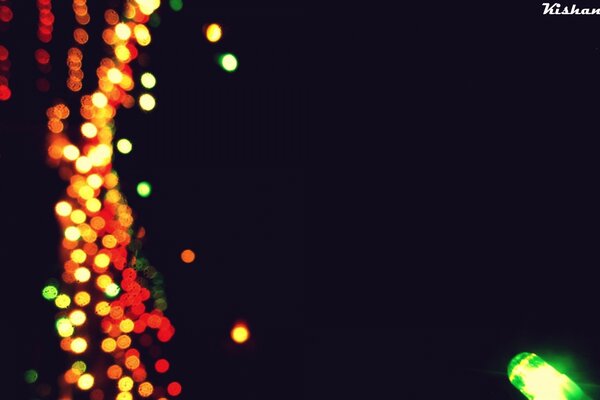 Dark screensaver with Christmas lights