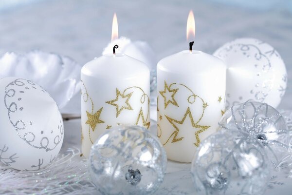A candle was burning on the Christmas table