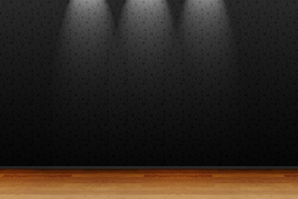 A gray wall with three lamps shining on it