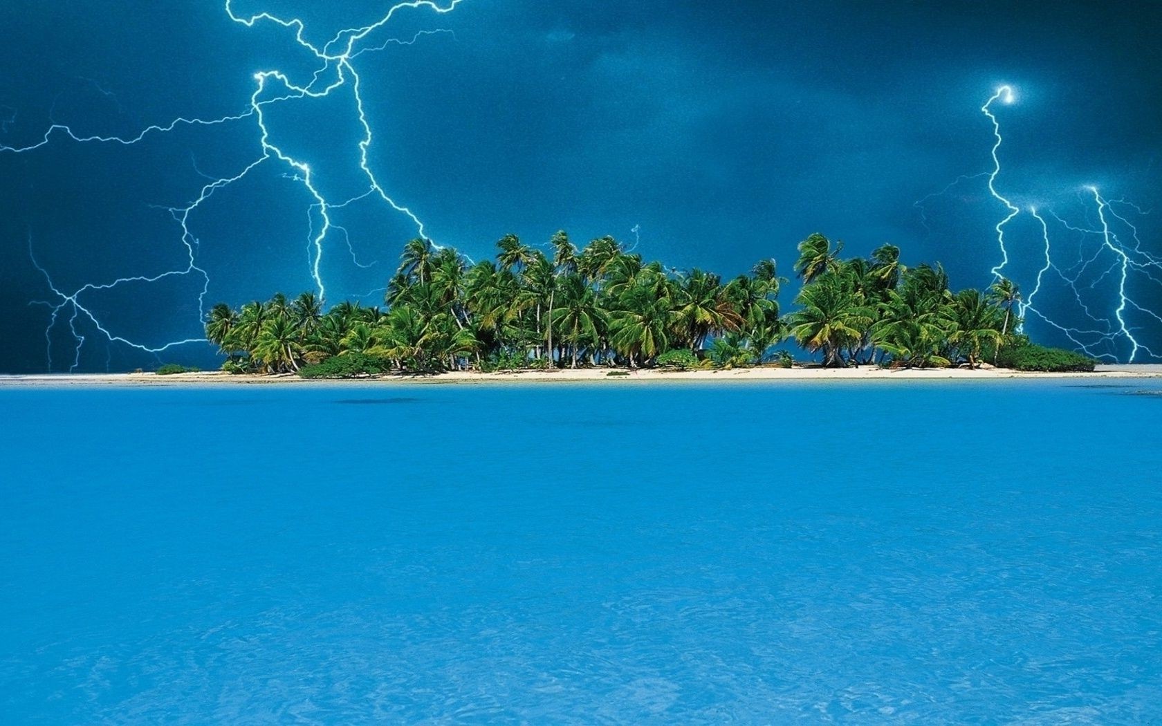 lightning water travel ocean island sea beach seashore sky vacation tropical seascape summer resort nature
