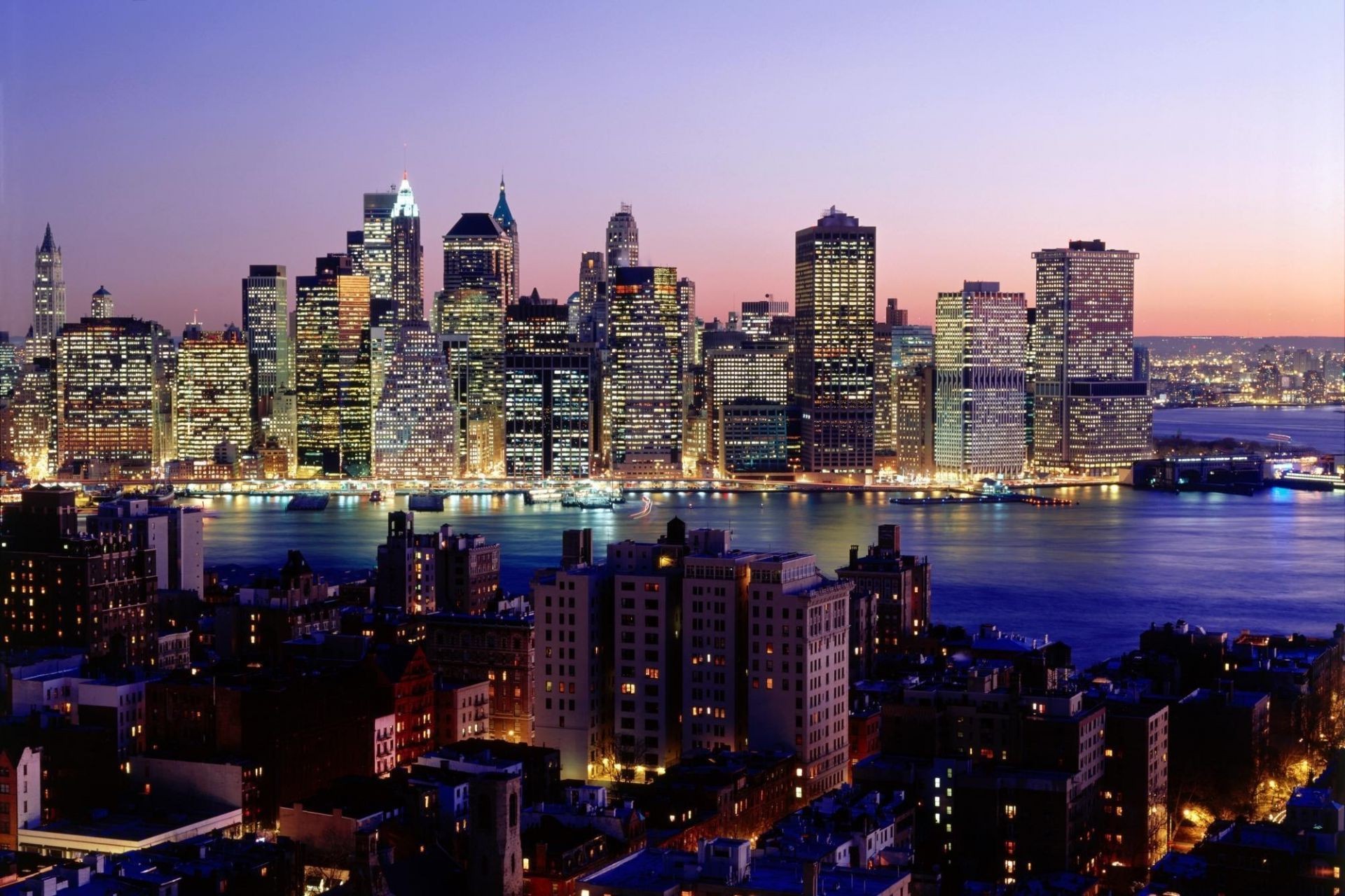 skyscrapers city skyscraper cityscape skyline downtown dusk architecture travel evening building office harbor waterfront illuminated urban business finance water sky