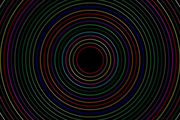 Desktop colored circles on a black background