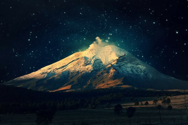 Fantastic mountain in the middle of the forest on the background of the starry sky