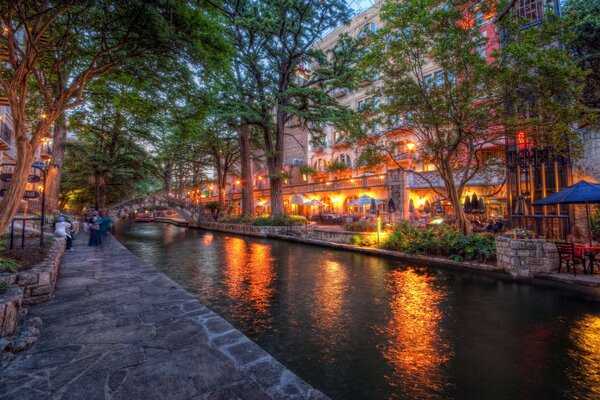Bright lights to the river at dusk landscape