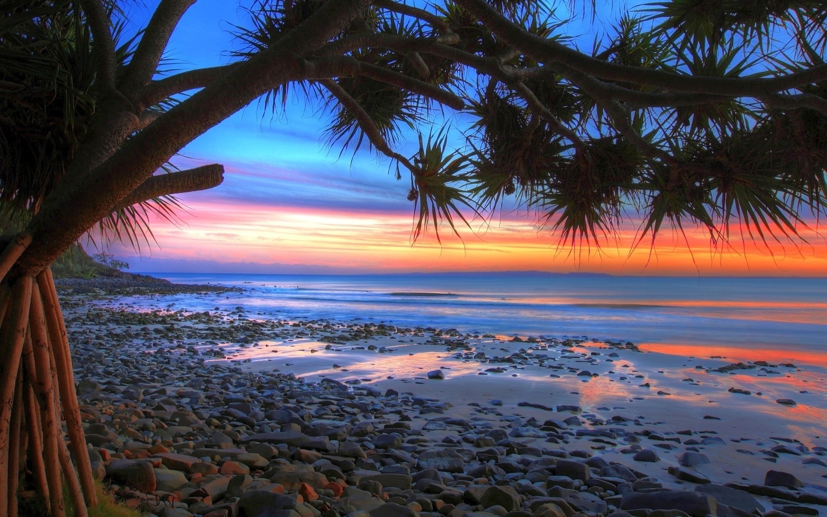 the sunset and sunrise beach seashore water ocean sand sun tropical travel sea summer sunset seascape vacation island sky relaxation resort idyllic paradise