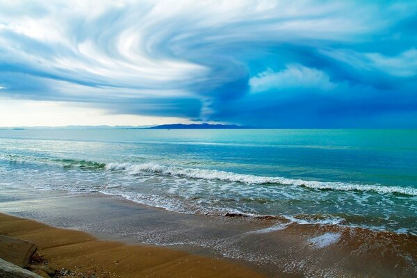 Clouds over the blue ocean