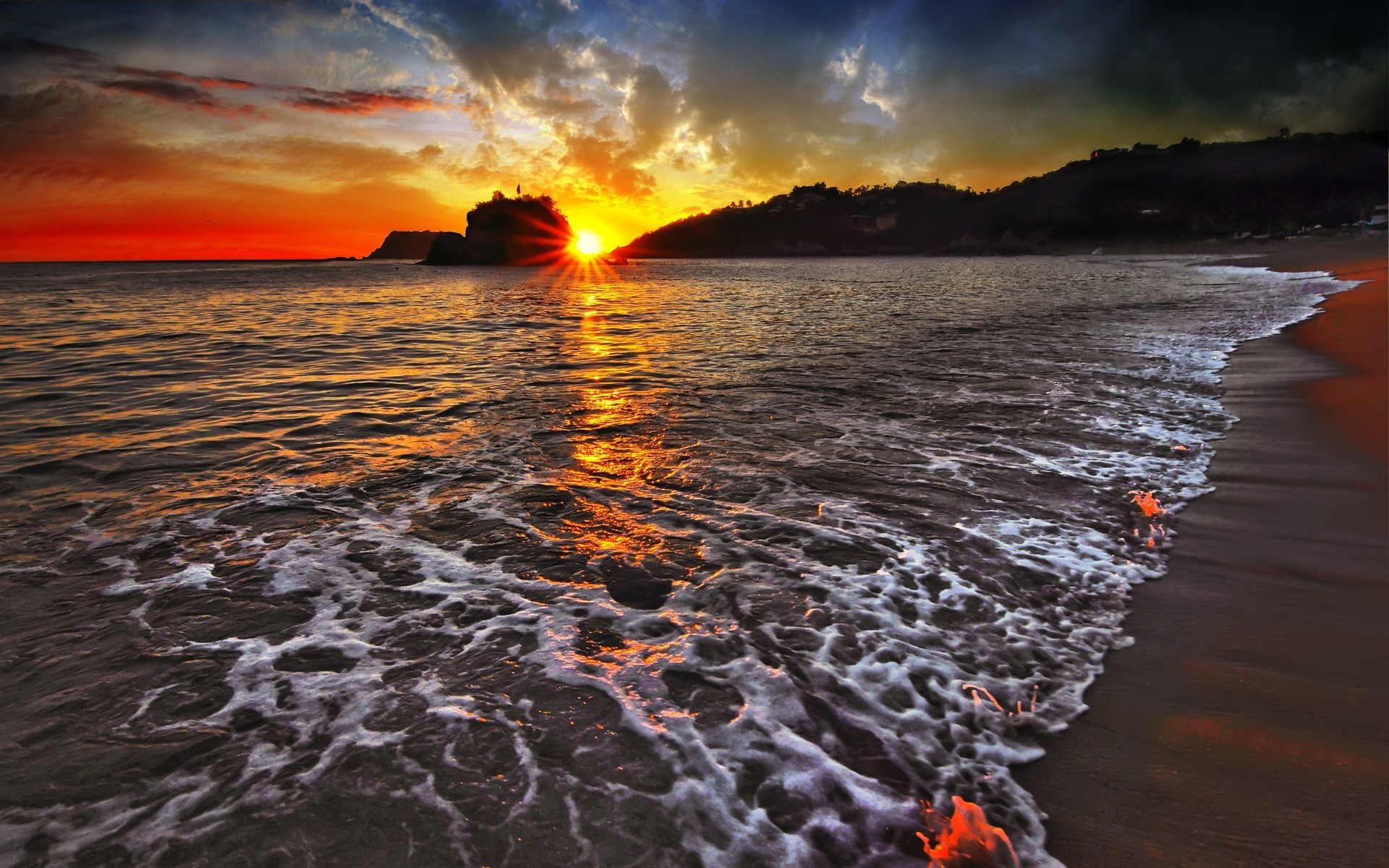 the sunset and sunrise sunset water dawn sun beach sea dusk ocean evening