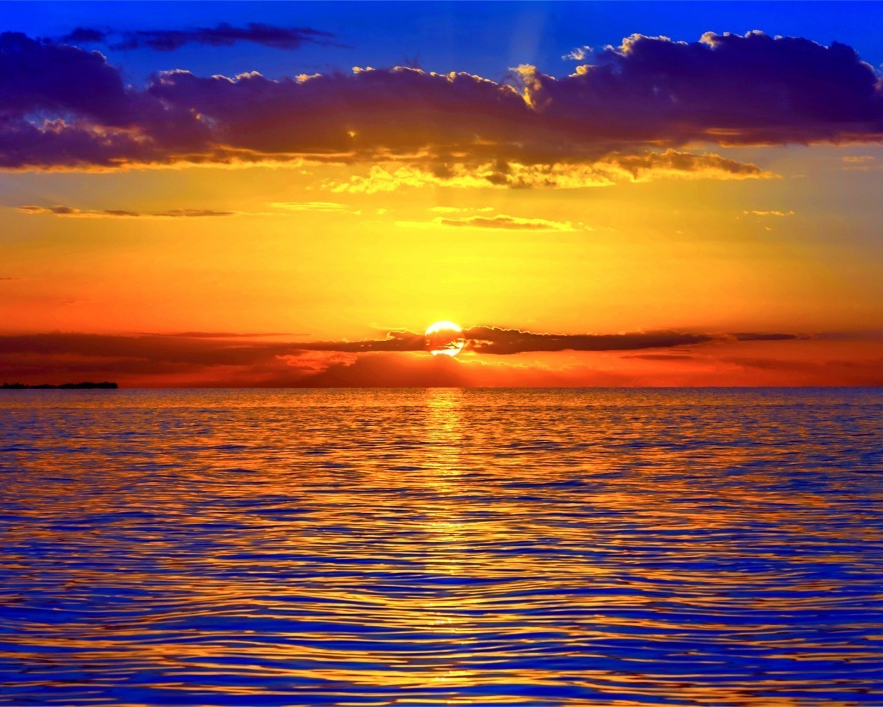 the sunset and sunrise sunset dawn sun water dusk sea evening ocean reflection fair weather sky summer beach nature