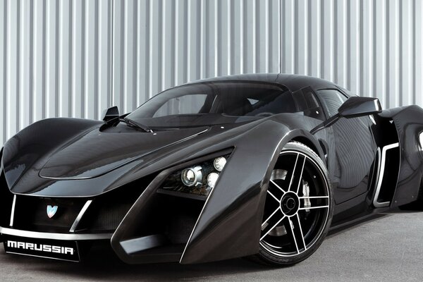 Black stylish sports car. Disks. Car design