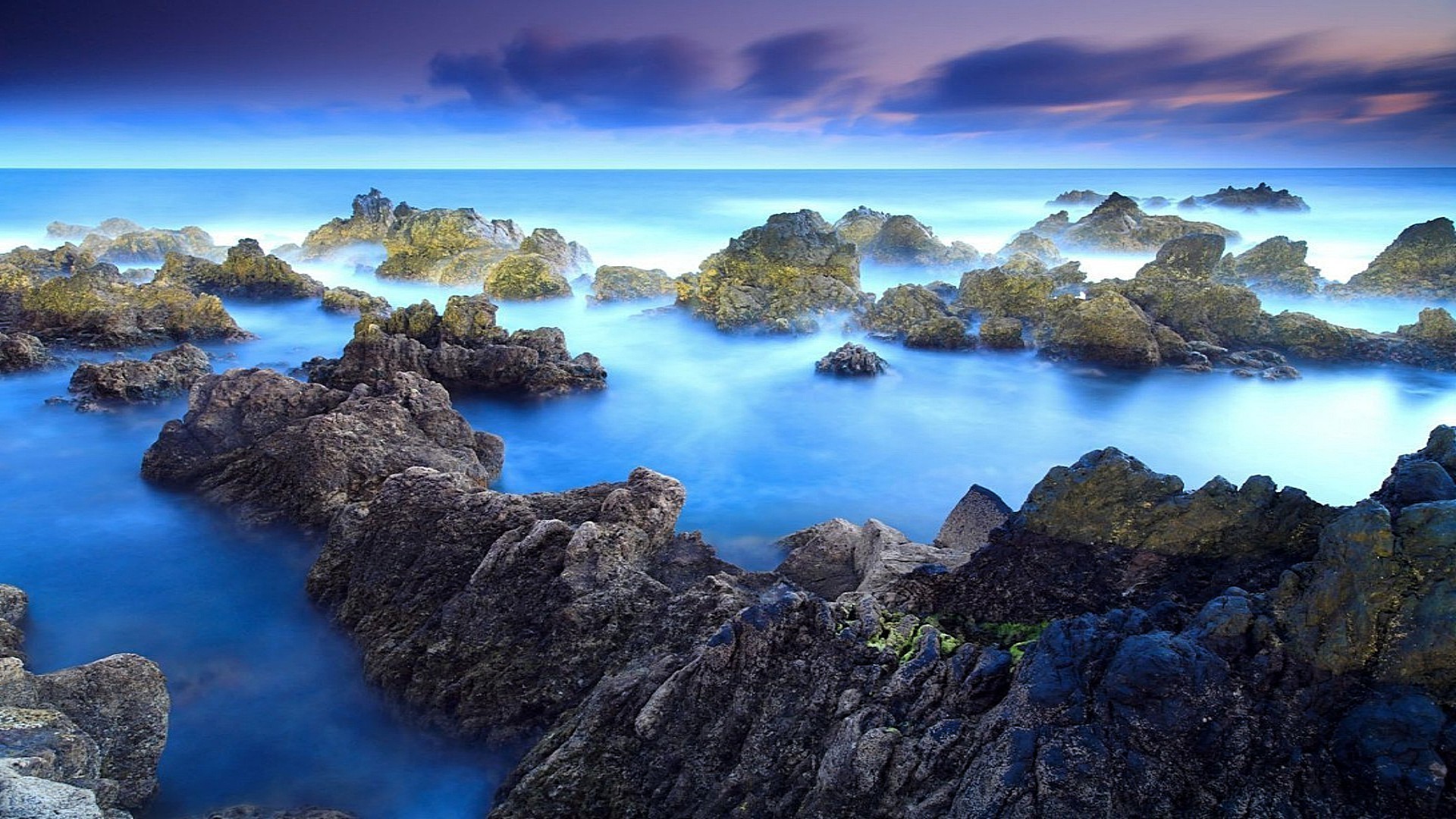 sea and ocean water sea ocean seashore sky travel beach seascape landscape sunset rock nature sun dusk