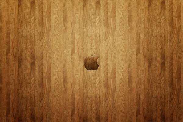 Apple logo on wooden surface