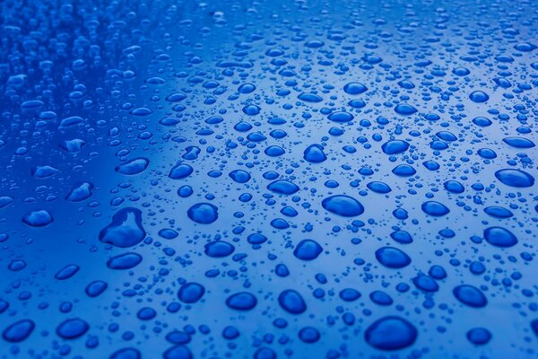 Large drops of water on the surface