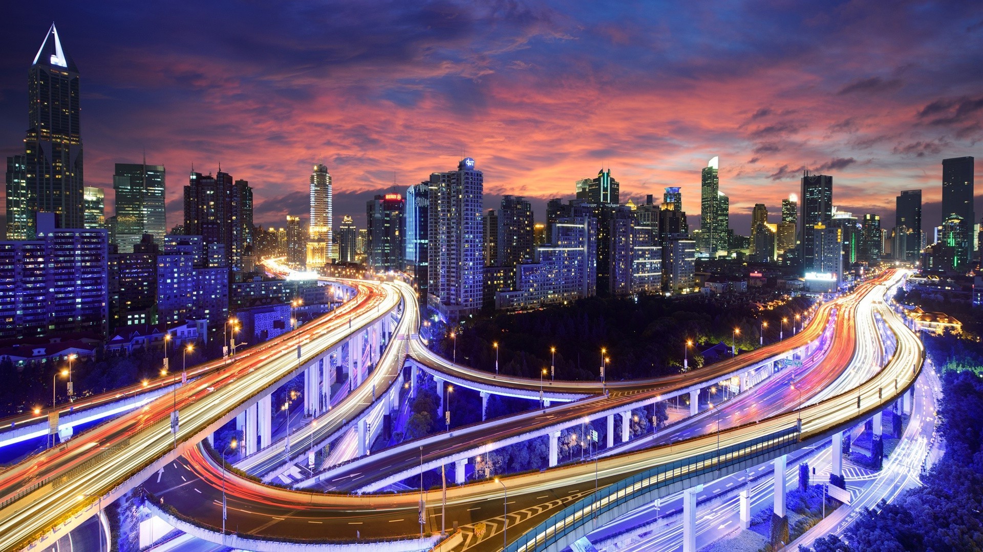 city and architecture dusk downtown traffic evening architecture city travel skyscraper cityscape illuminated modern building highway transportation system urban bridge skyline blur fast