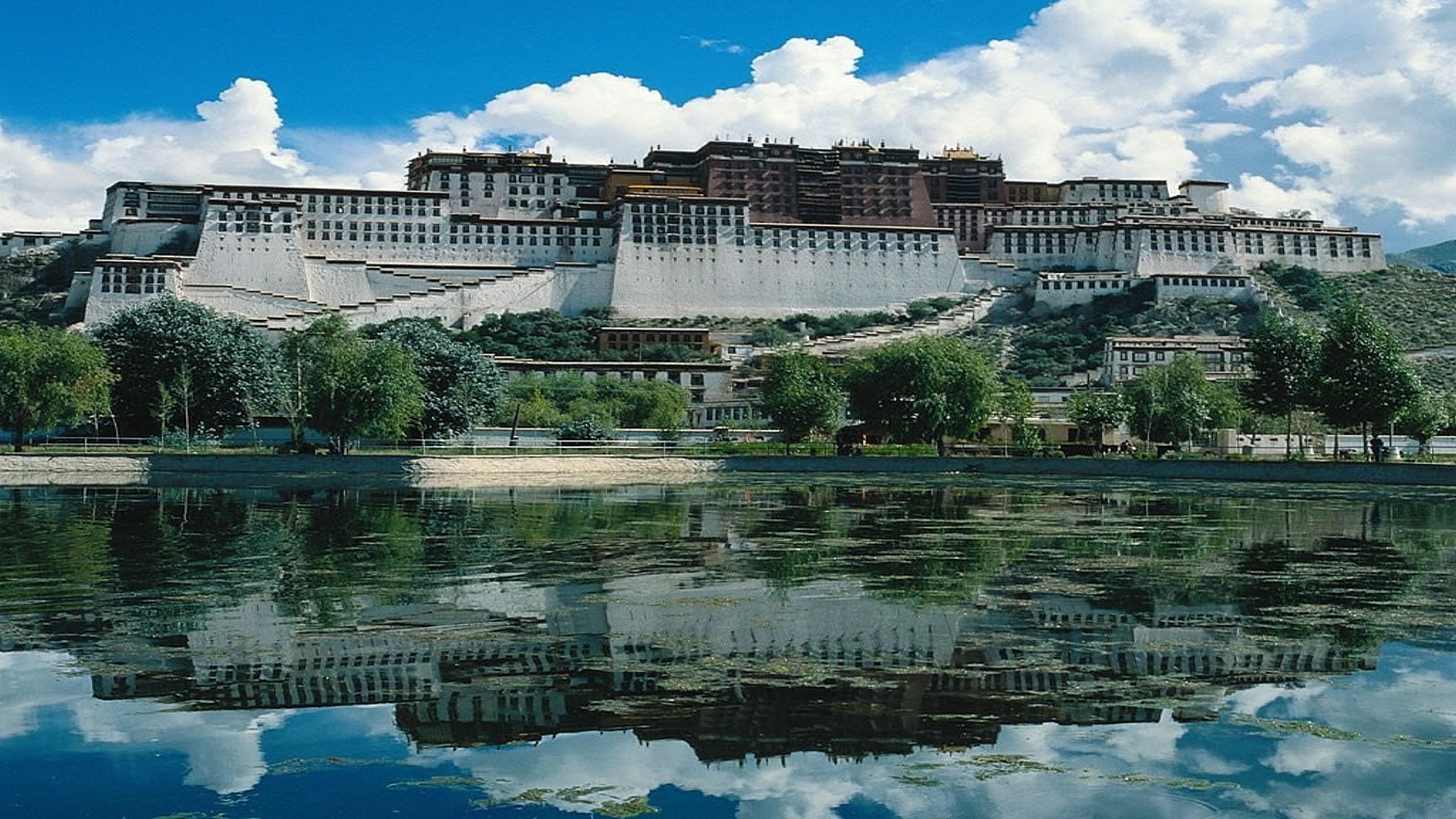 ancient architecture water travel city architecture building tourism sight sky urban house river vacation summer town landmark outdoors old reflection tree